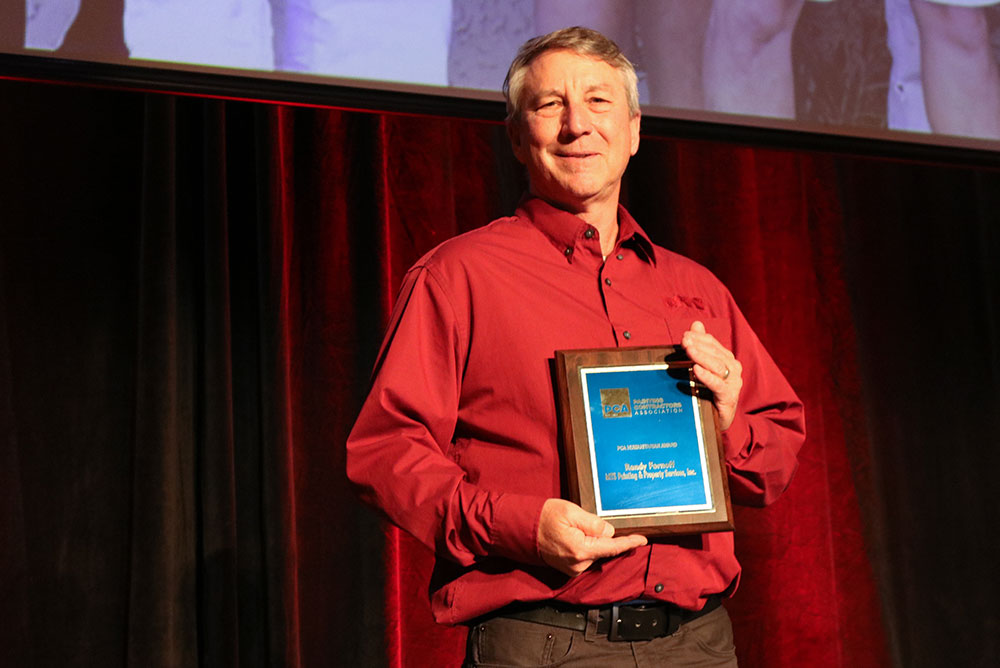 Randy Fornoff with Award